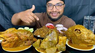 SPICY GOAT LIVER CURRY, FULL CHICKEN CURRY, GOAT HEAD CURRY AND MUTTON BOTI CURRY WITH RICE EATING