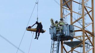 RAW: Rope rescue team called after crane operator suffers medical issue