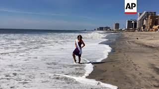 New Miss America, Cara Mund, takes part in traditional post-crowning toe dip in the Atlantic Ocean