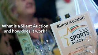 What is a silent auction and how does it work?