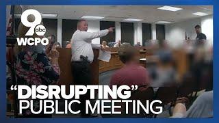 Lawsuit claims men were illegally arrested for criticizing city officials at meeting