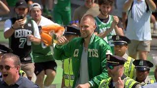 Boston Celtics Kristaps Porzingis arrives at duck boat parade