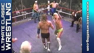 Team USWA vs Team WCCW in a Thunderdome Cage Match