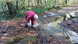 Culvert unblocking with a drain rod and plunger