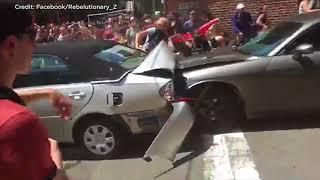 Video shows car ramming into protesters in Charlottesville