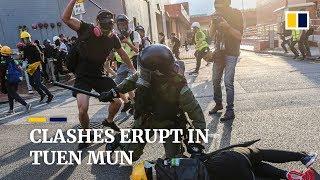 Petrol bombs and tear gas in tense stand-off in Tuen Mun, Hong Kong