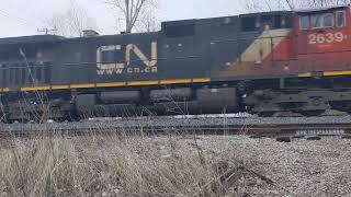 CN A438 passes Chatham CN yard. Apr 20, 2022