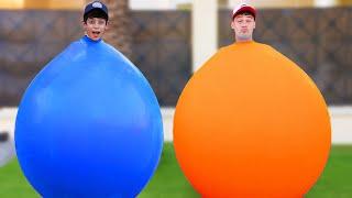 Jason and Alex Sharing Adventure with Funny Lifesize Balloons