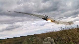 Ka-52 firing rockets and deploying Flares.