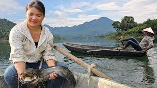 The girl fished overnight and caught a big fish.