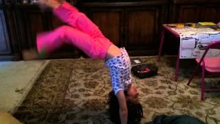 5 year old gymnast Natalia shows off a new skill