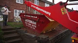 Delivering a 6 Yard Skip over a small wall in Bristol