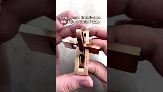 A simple trick to take apart this metal Puzzle. #puzzles
