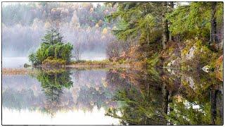 Landscape photography at a misty Scottish loch