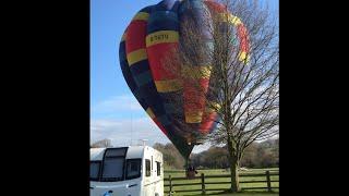 Unexpected hot air balloon lands at Greenacres Bungalow CL caravan site, Ellastone, Ashbourne 2/4/22