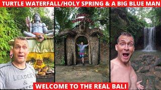 Bali Indonesia Suwat (Turtle Waterfall) Holy Spring and a Huge Blue Man