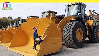 Real Construction Trucks for Children | Learn about CAT Construction Trucks!