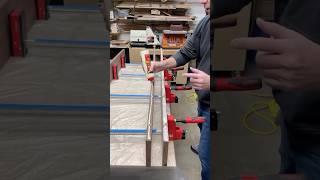 Gluing up part of a walnut table top ￼