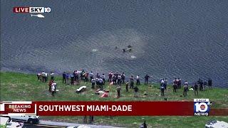 Car crashes into canal in west Miami-Dade