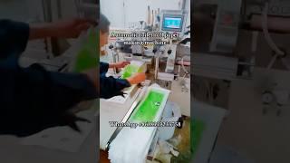 Automatic toilet tissue paper roll cutting and packing machine