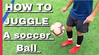 How To Juggle a Soccer Ball For Beginners | Soccer Juggling Tutorial