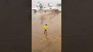 Aircraft marshal dancing. Toronto Pearson airport.