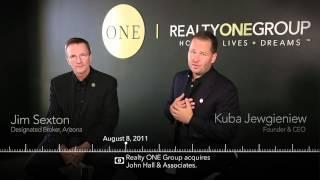 Kuba Jewgieniew of Realty ONE Group talks to John Hall & Associates