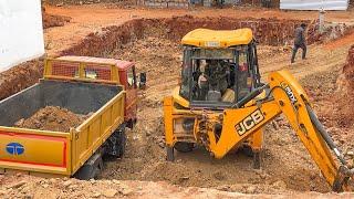 JCB 3DX Breaker with Bucket Loading rock New Truck for New Apartment Underground day night Work