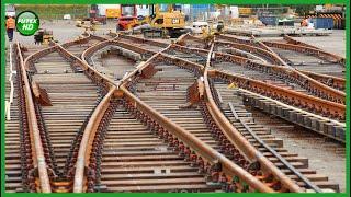 The entire process from manufacturing railroad tracks to installing and repairing them.