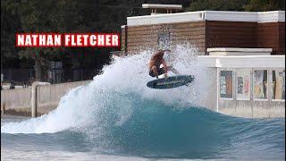 Nathan Fletcher surfing in a pool