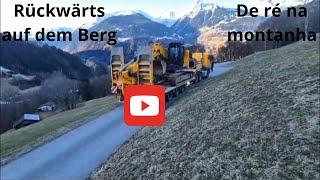 Maschinentransport mit Panoramablick – Ein Bagger erobert die Berge( Montanha com uma visão incrível