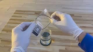 Thick nitinol wire tossed in hot water, breaks glass beaker.