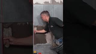 How to cut tiles around the corner of a bath with Craig Phillips! #shorts