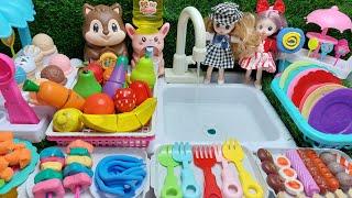 cook mini food dishes in the kitchen set by cutting fruit and vegetables #hellokitty #sanrio #japan