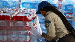 Aiding the Firefight; Corpsmembers Keep Firefighters Supplied at Sites Fire Base Camp