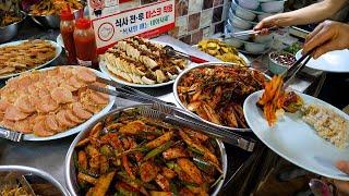 A Korean buffet run by a grandmother with many kinds of side dishes at a reasonable price