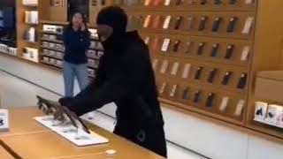 This is insanity!!! Man Steals 100 iPhones while the Police was outside the store