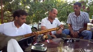 Drinking Moroccan mint tea while playing some traditional Amazigh music of Atlas Mountains