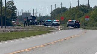 Woman found dead on side of road in League City, police say