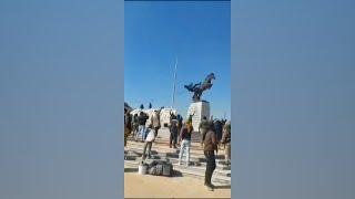 Syrians in Aleppo topple statue, as rebels control city | VOA News