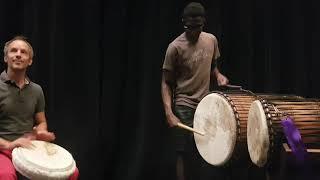 Kuku (as part of Gift is Busking to Build his own Drum)