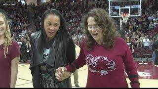 Shawn Kiser's walk with Dawn Staley