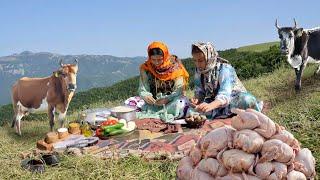 Nomads Outdoor Cooking of Stuffed Chicken and white Rice on Campfire