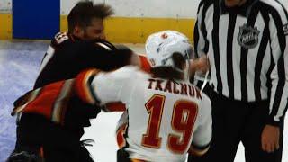 Ryan Kesler sends Matthew Tkachuk's mouthguard flying with right fist