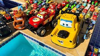 Disney Pixar Cars falling into deep pool, Lightning McQueen, Tow Mater, Mack, Sally, Francesco