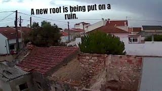 A new roof is being put on a ruin.  We are renovating a ruin.