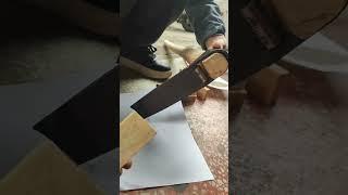 The craftsman's technique for installing a handle on a hoe