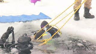 100 dive below White Bear Lake in world record attempt