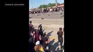 RAW: Semi truck drives through crowded I-35W during George Floyd protest