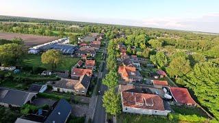 Drone Footage of Flat Dutch Farmland, Villages, and Canals | Nieuwhorne, Katlijkerschar, De Tjonger